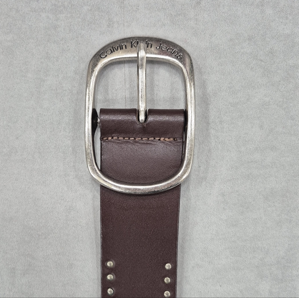 Calvin Klein belt women's large brown leather riveted studs silver logo buckle - Picture 3 of 15